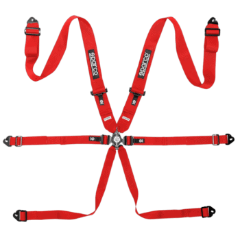 Red Sparco racing harness with adjustable straps and quick-release buckle for motorsport safety.