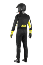 Professional racing driver in black and yellow Grand Prix Racewear suit with helmet, standing in a racing pose.