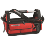 Red and black Facom tool bag with adjustable shoulder strap and multiple compartments for professional racewear tools.