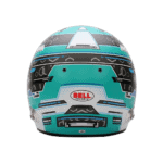 Close-up of a Bell racing helmet with a futuristic design in blue, black, and white, featuring the Bell logo at the front.