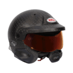 Bell racing helmet with carbon fibre finish and tinted visor, designed for motorsport safety and performance.