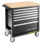 Facom heavy duty black 6-drawer tool cabinet with wooden top and caster wheels for mobility.