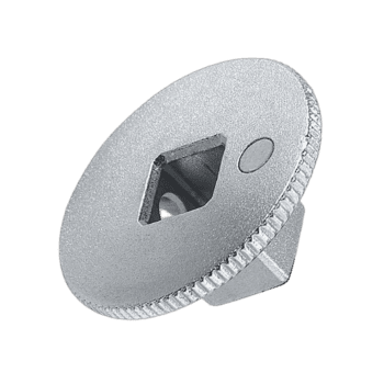 Silver metal racing part with a square hole and textured edge, used in Grand Prix racewear for motorsport safety and performance.