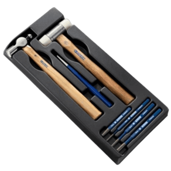 Set of Facom shock tools including hammers, chisels, and punches in a black presentation box for professional use.