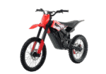 Electric dirt bike with red front fender and black frame, suitable for off-road racing and motocross enthusiasts.
