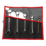 Set of six Facom combination wrenches in a grey and black tool roll with red trim, ideal for professional mechanics.