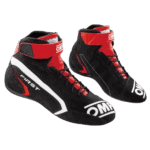 High-performance OMP racing shoes in black and red with white accents, designed for motorsport drivers for optimal grip and comfort.