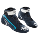 High-performance OMP racing shoes designed for motorsport, featuring a sleek navy blue and white design with branding and a secure ankle strap.