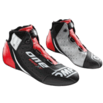 Grand Prix Racewear racing shoes in black, red, and grey with branding, designed for motorsport enthusiasts and professional racers.