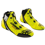 Yellow Grand Prix racing shoes with black and white accents, designed for professional motorsport performance.