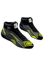 High-performance OMP Grand Prix Racewear racing shoes in black with yellow accents, designed for motorsport enthusiasts and professional drivers.