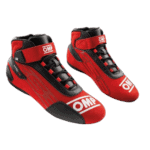 Red and black Grand Prix racing shoes by OMP with high ankle support and secure fastening for motorsport drivers.