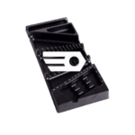 Facom plastic tray containing a medium socket level, screwdriver bits, and a small wrench for precision tasks.