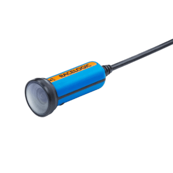 Racelogic automotive sensor with blue and orange casing and attached black cable for vehicle data analysis.
