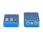 Blue electronic racing sensor with multiple connectors, used in Grand Prix racewear for motorsport data acquisition.