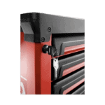 Close-up of a red and black Grand Prix Racewear tool chest with a lock and key, showcasing durable construction for motorsport equipment storage.