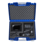 RaceLogic racing data logger kit in a blue protective case with foam padding, including a display unit, power adapter, and cables, for motorsport performance analysis.