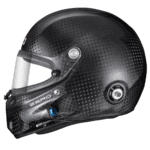 Carbon fibre racing helmet with aerodynamic design, suitable for motorsport enthusiasts and professional racers.