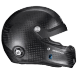 Carbon fibre racing helmet with aerodynamic design, suitable for motorsport safety and performance.