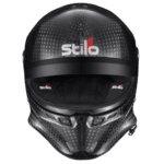 Stilo racing helmet with carbon fibre finish and aerodynamic design, ideal for motorsport safety and performance.