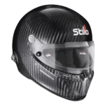Carbon fibre racing helmet by Stilo, designed for motorsport safety and performance, featuring a clear visor and aerodynamic shape.