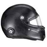 Carbon fibre racing helmet with aerodynamic design, suitable for motorsport enthusiasts and professional racers.