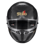 Stilo racing helmet with carbon fibre finish and clear visor, designed for motorsport safety and performance.