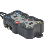 Digital audio mixer with multiple control buttons and input/output ports, used in professional sound systems and broadcasting.