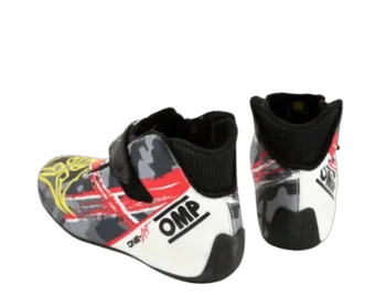 Child's racing shoes with a colourful design featuring red, yellow, black, and white, suitable for motorsport activities.