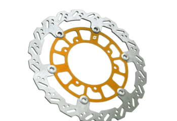 High-performance motorcycle brake disc with a silver outer ring and gold inner component, designed for racing bikes.
