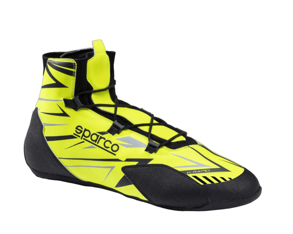 High-visibility yellow and black racing shoe from Grand Prix Racewear, designed for motorsport safety and performance.