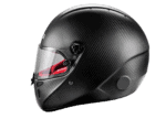 High-performance black carbon fibre racing helmet with clear visor, designed for motorsport safety and style.