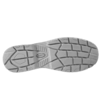Close-up of a grey racing shoe sole designed for grip and durability in motorsport racing.