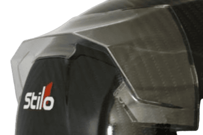 Close-up of a racing helmet with Stilo branding, designed for motorsport safety and performance.