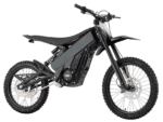 Electric dirt bike with black frame and knobby tires, designed for off-road racing and riding.