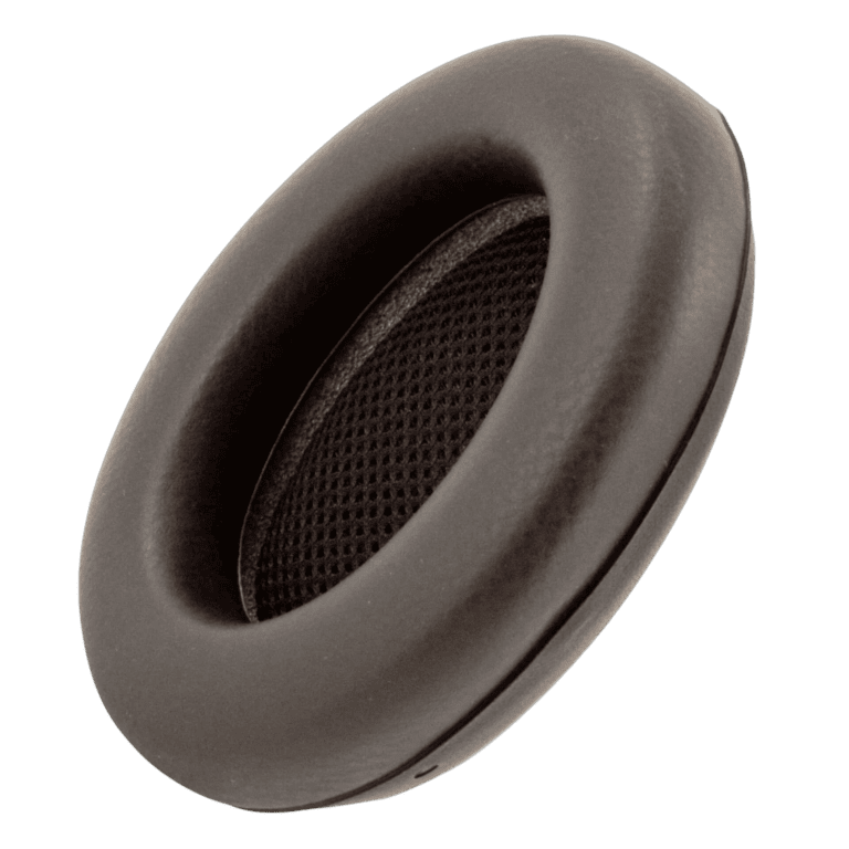 Close-up of a black racing helmet ear cup with mesh ventilation for Grand Prix Racewear.