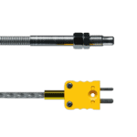 Close-up of high-performance racing electrical connectors used in motorsport applications.