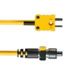 Close-up of a yellow electrical power plug and socket, used in racing equipment for safety and performance.