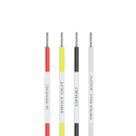 Close-up of four electrical wires with different coloured insulation and labels, used in Grand Prix Racewear for high-performance racing applications.