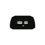 Close-up of a racing data logger device with dual connectors, used in motorsport for performance analysis.
