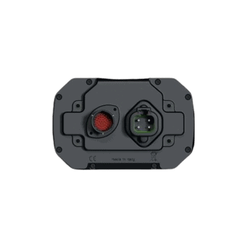Close-up of a racing car electrical connector with red and black components on a black background.