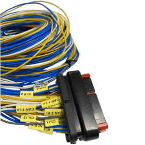 Close-up of a bundle of multicoloured wires with a black connector, used in racing car electronics and telemetry systems.