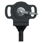 Close-up of a racing helmet communication device with a microphone and control unit, used in motorsport safety gear.