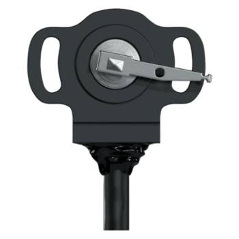 Close-up of a racing helmet communication device with a microphone and control unit, used in motorsport safety gear.