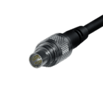 Close-up of a professional racing car connector cable for Grand Prix Racewear equipment, black with metallic details.