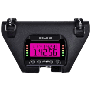 Race timing device with pink digital display showing 1:42.56, used in motorsport events for lap timing and race management.
