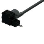 Close-up of a black electronic sensor or actuator with a long rod, used in racing or automotive applications.