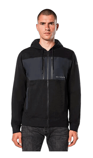 Male model wearing Grand Prix Racewear black and grey zip-up hoodie, front view, for motorsport enthusiasts.