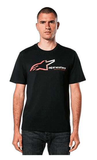 Young man wearing black AlpineStars Grand Prix Racewear T-shirt, standing against a plain background.