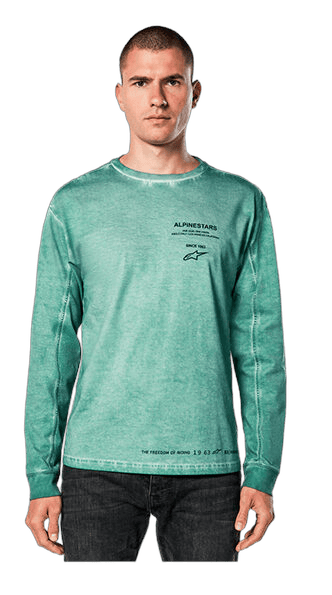 Male model wearing Grand Prix Racewear long-sleeve racing shirt in teal with sponsor logos, showcasing high-quality motorsport apparel.